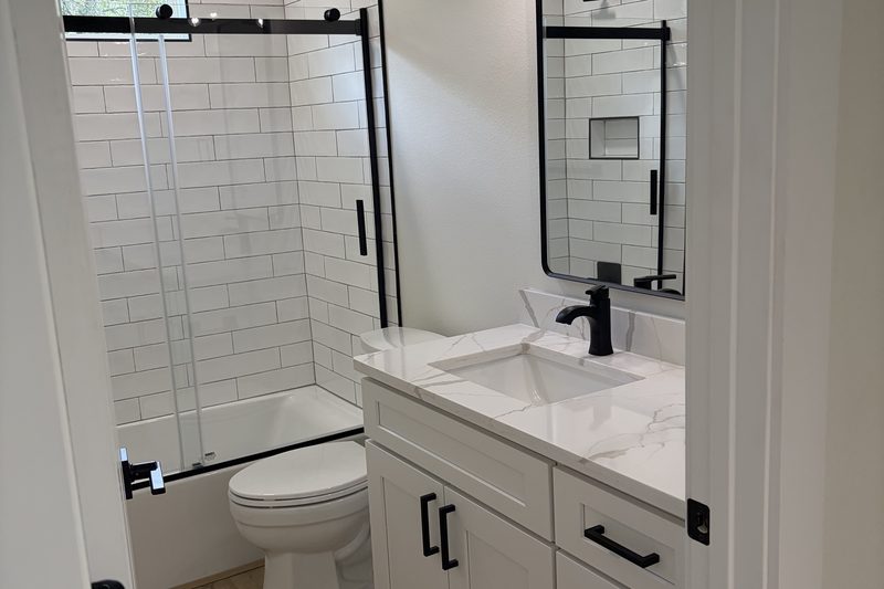 Bathroom tile, tub and vanity after a deep clean