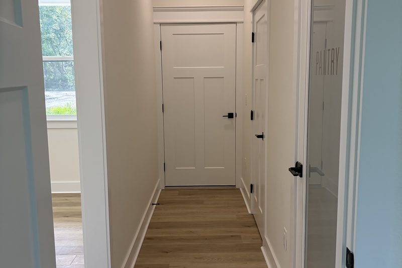 Cleared hallway of an empty home, cleaned and ready